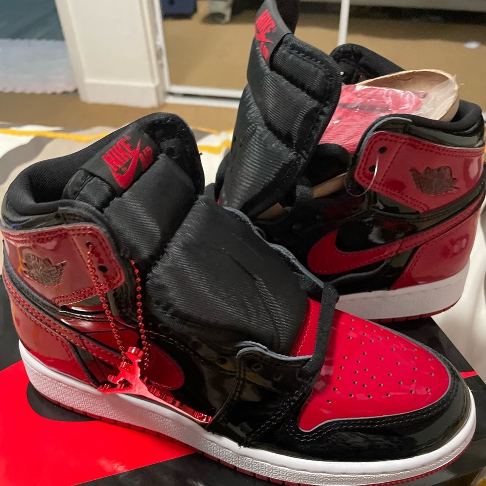 - Air  Jordan 1 retro high OG patent bred